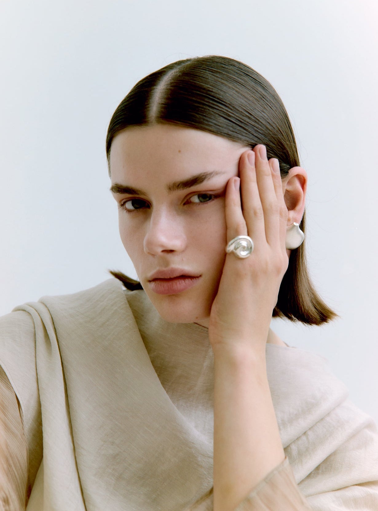 Woman wearing silver jewelry