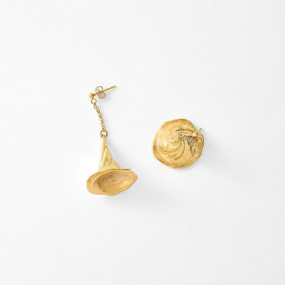 A pair of textured gold earrings on a clean white background.