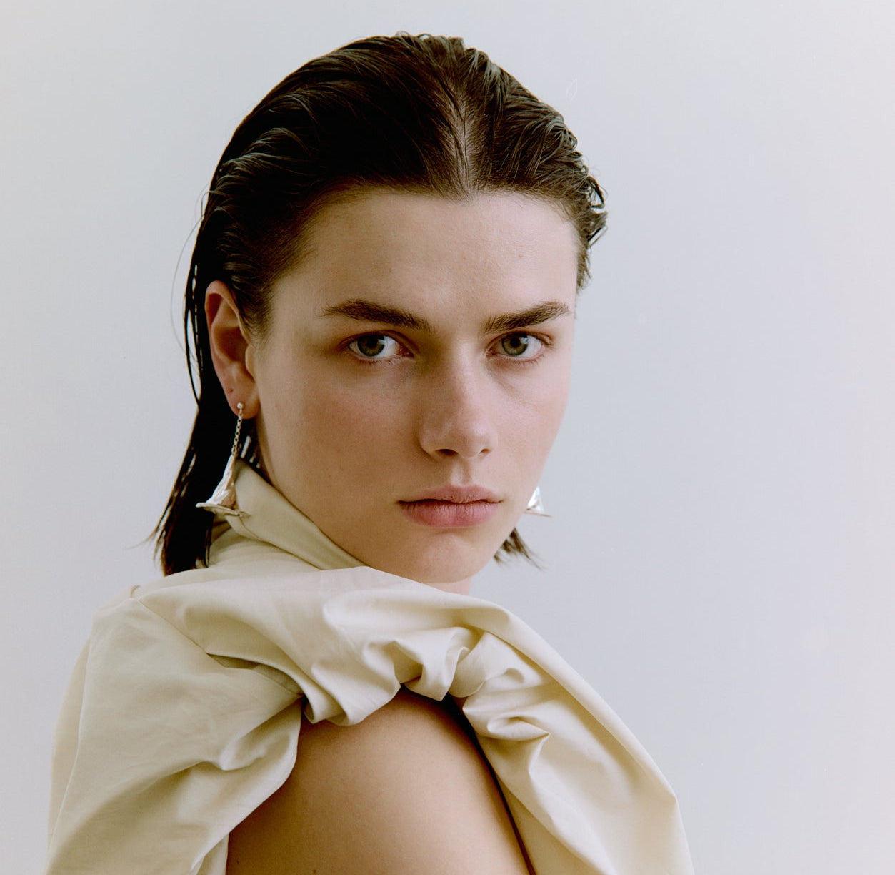 Woman wearing silver earrings