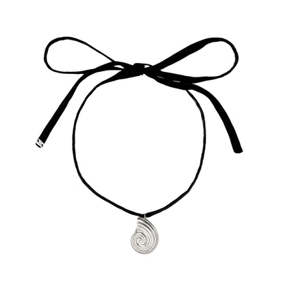 Large silver pendant with black silk ribbon