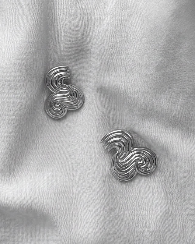 A pair of silver earrings