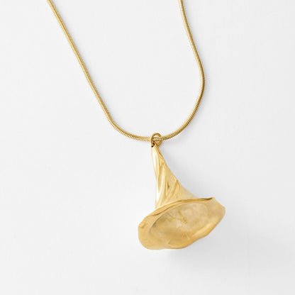 Gold necklace on a white background