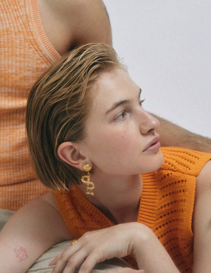 Woman wearing gold jewelry