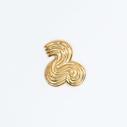 Sculptural gold brooche