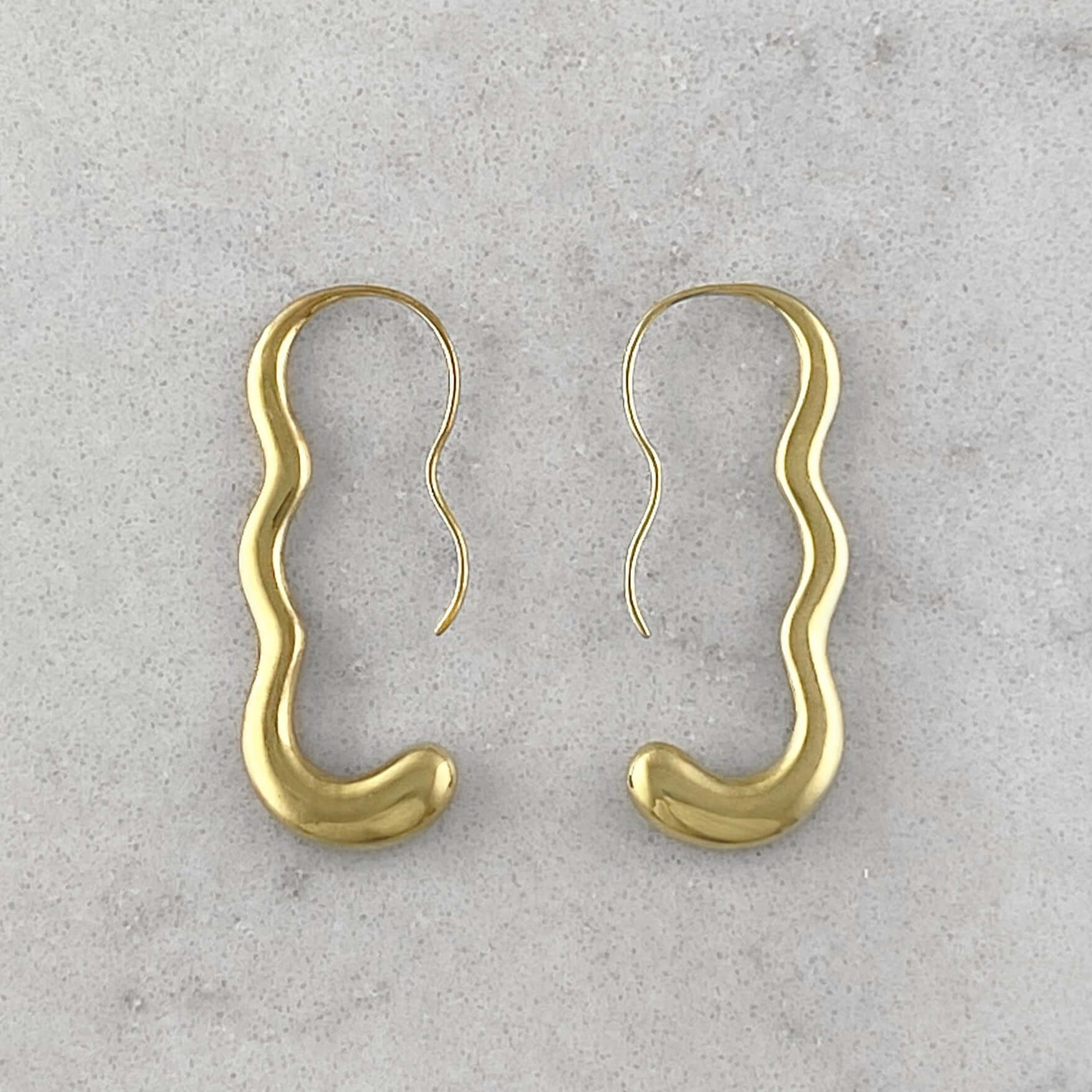 product photo of gold plated earrings by Aur Studio