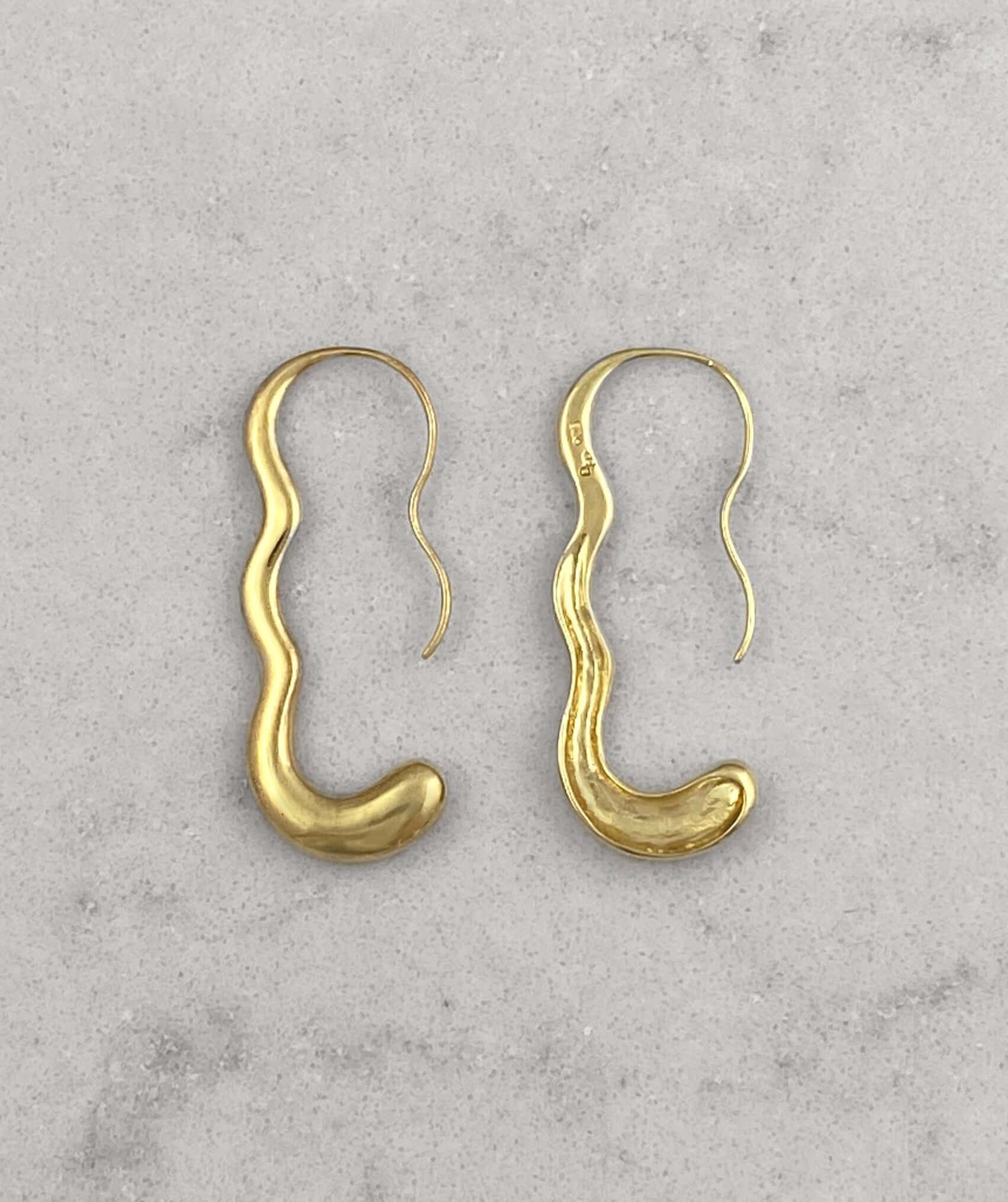 Product photo of earrings front and back