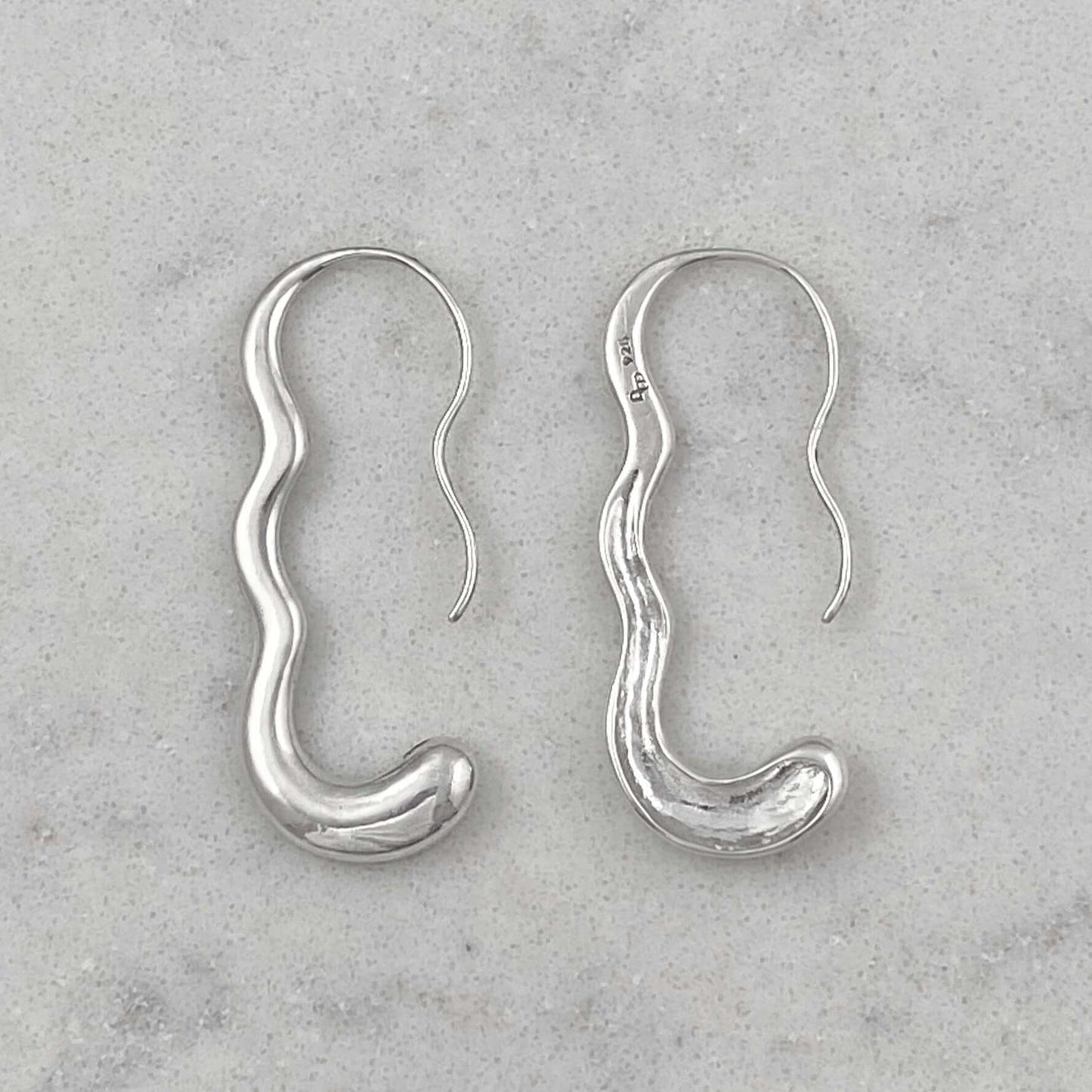 Product photo of earrings front and back