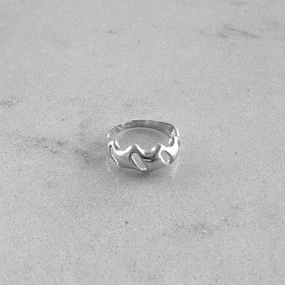 Product photo of a silver ring by Aur Studio