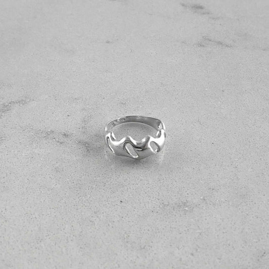 Product photo of a silver ring by Aur Studio