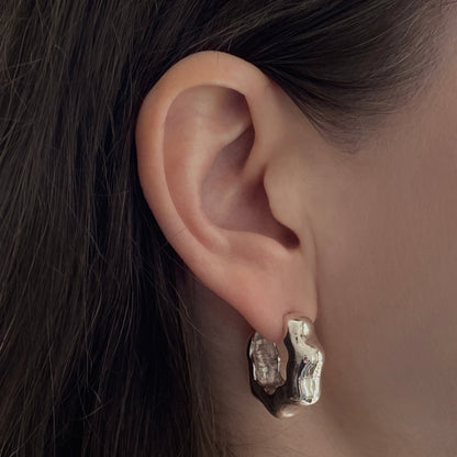 Ear with silver hoops