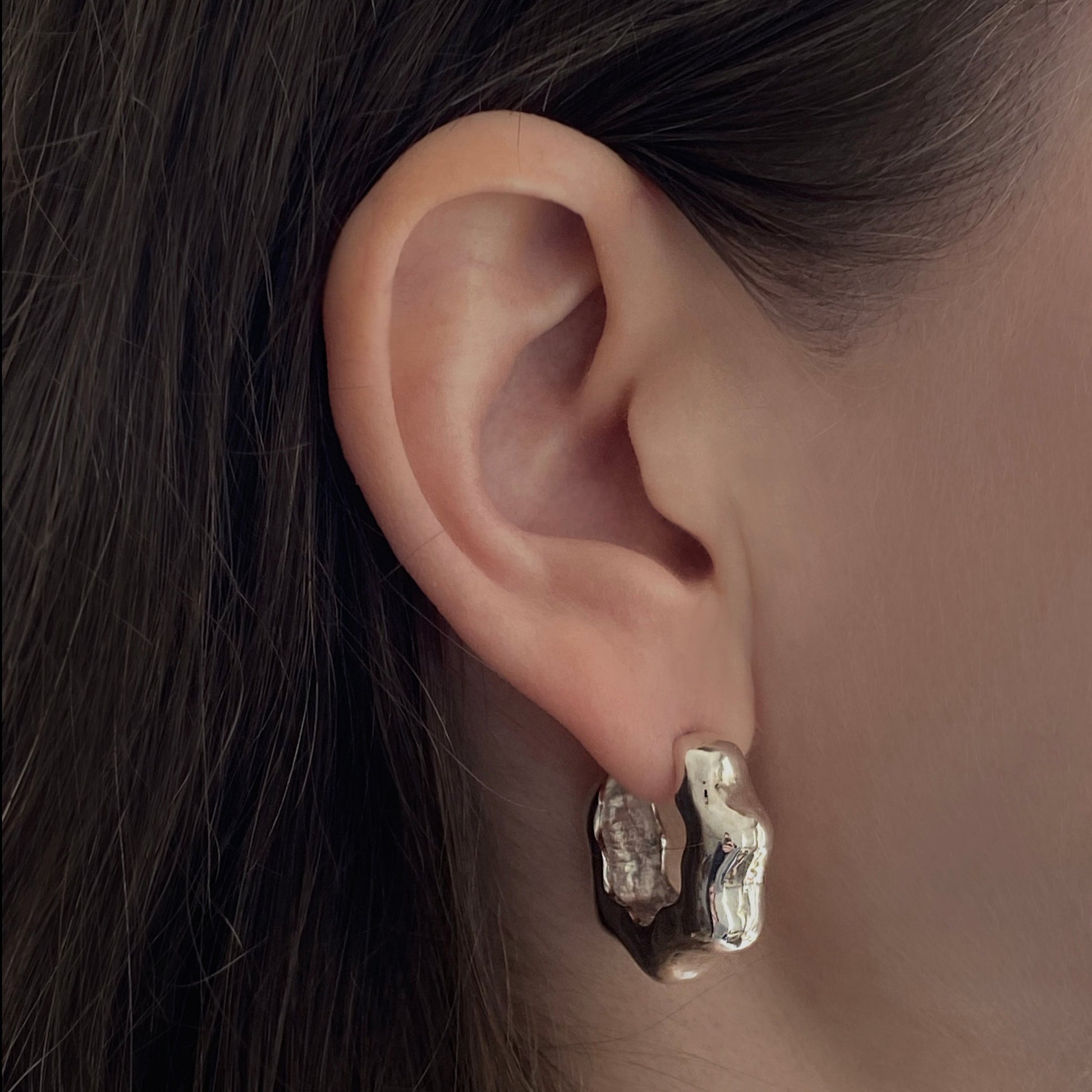 Ear with silver hoops