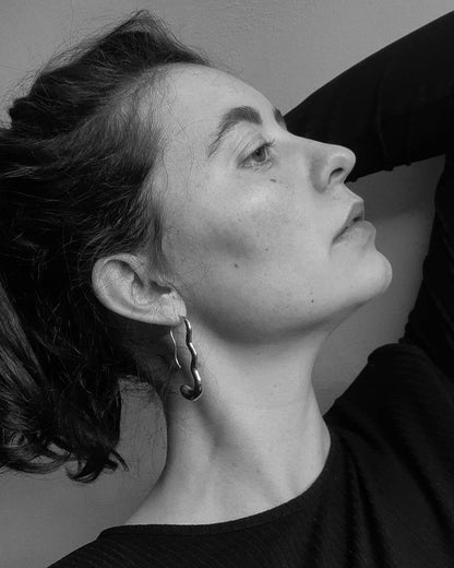 Woman wearing silver jewelry